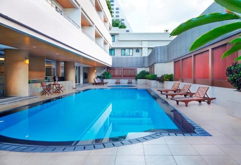 Property building, Patio, Pool view, Swimming pool, sunbed