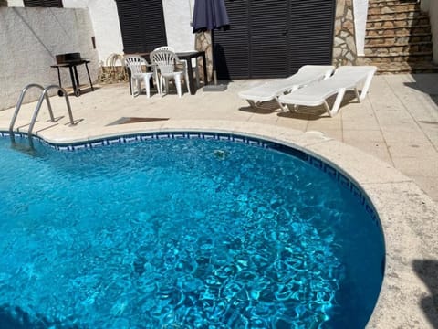 Property building, Living room, Swimming pool
