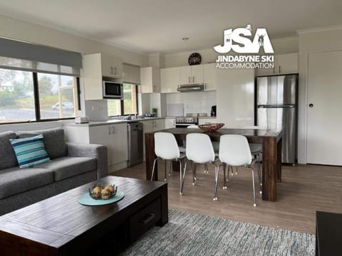 Kitchen or kitchenette, Living room, Seating area, Dining area, dishwasher, oven, stove, toaster