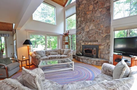 TV and multimedia, Living room, Seating area, Garden view, fireplace, furniture