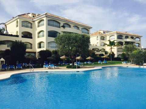 Property building, Pool view, Swimming pool, sunbed