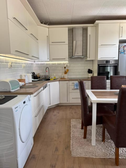 Kitchen or kitchenette, Seating area, Dining area, dishwasher, oven, stove, toaster