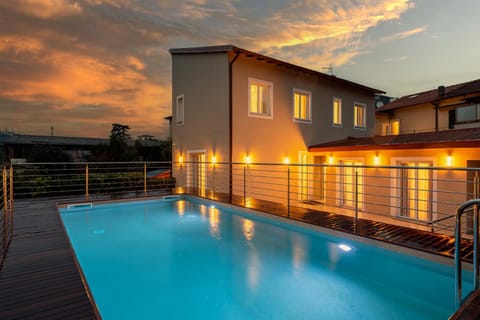 Property building, Day, Pool view, Swimming pool, Swimming pool, Sunset