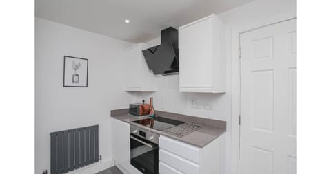 Kitchen or kitchenette, oven