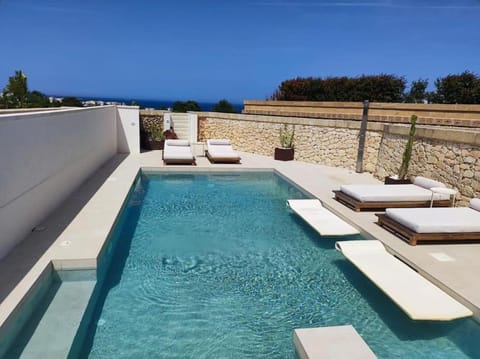 Patio, Natural landscape, Pool view, Swimming pool, sunbed