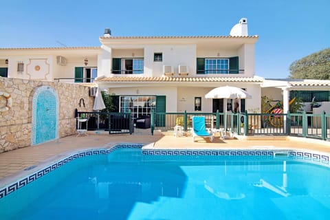 Property building, Living room, Swimming pool