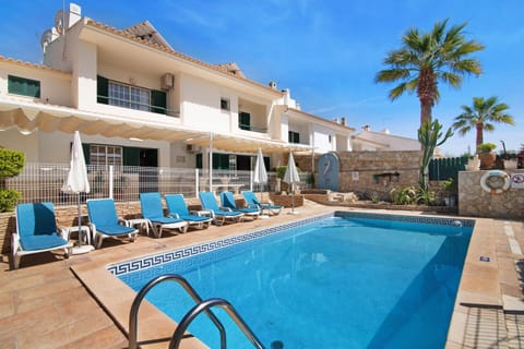 Property building, Living room, Swimming pool