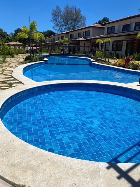 Property building, Day, Pool view, Swimming pool, sunbed