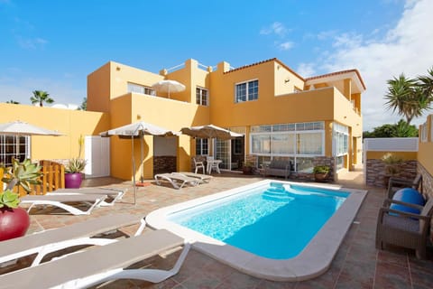 Property building, Living room, Swimming pool