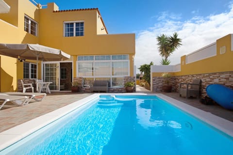 Property building, Living room, Swimming pool