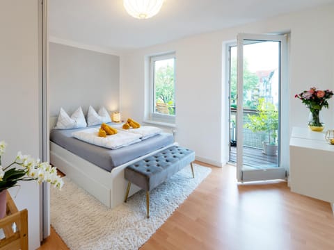 Bed, Balcony/Terrace, Balcony/Terrace, Decorative detail, Decorative detail, Bedroom, flat iron, hair dryier, towels, towels, wardrobe