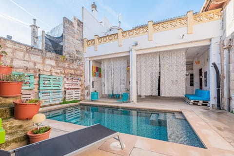 Property building, Living room, Swimming pool
