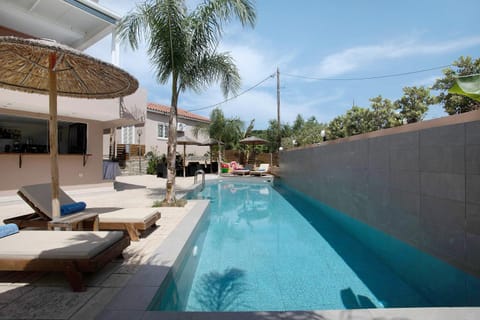 Property building, Living room, Swimming pool
