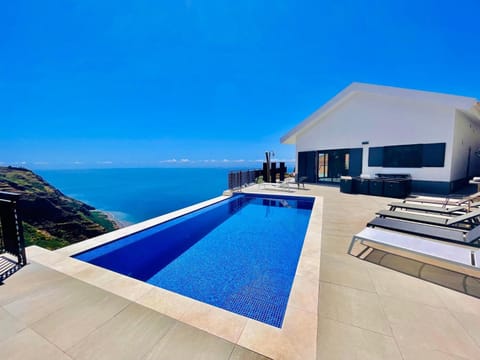 Property building, Living room, Swimming pool