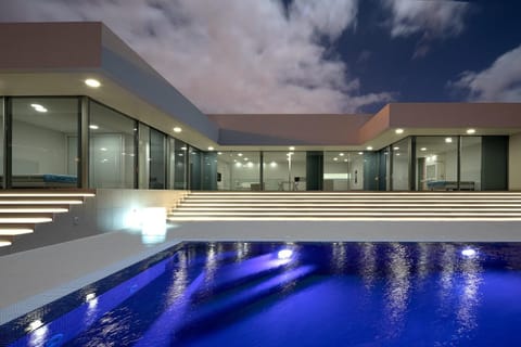 Property building, Living room, Swimming pool