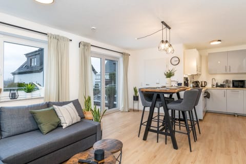 Kitchen or kitchenette, Living room, Seating area, Dining area