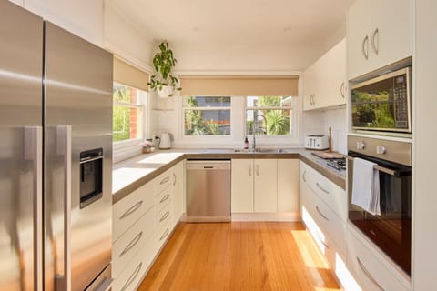 Kitchen or kitchenette, dishwasher, oven, stove, toaster