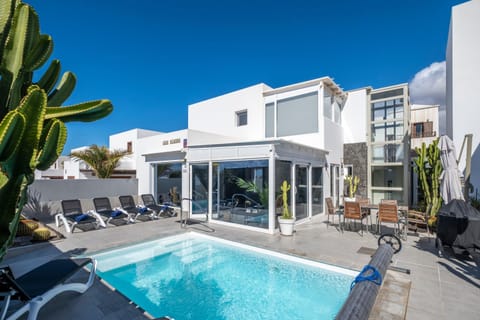 Property building, Living room, Swimming pool