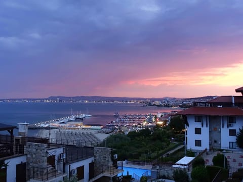 Property building, Nearby landmark, Day, Natural landscape, City view, Sea view, Sunrise, Sunset