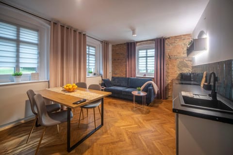 Kitchen or kitchenette, Living room, Seating area, Dining area
