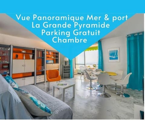 Bird's eye view, View (from property/room), Living room, Seating area, Text overlay, City view, Garden view, Sea view