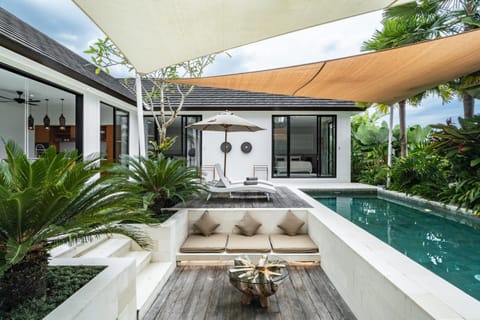 Property building, Seating area, Pool view, Swimming pool, sunbed