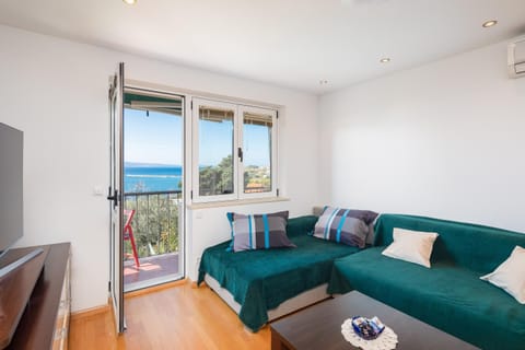View (from property/room), Balcony/Terrace, Living room, Seating area, Sea view