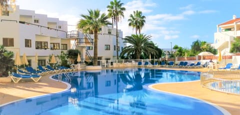 Property building, Pool view, Swimming pool, sunbed