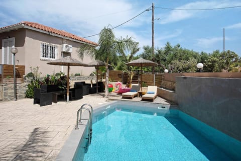 Property building, Living room, Swimming pool