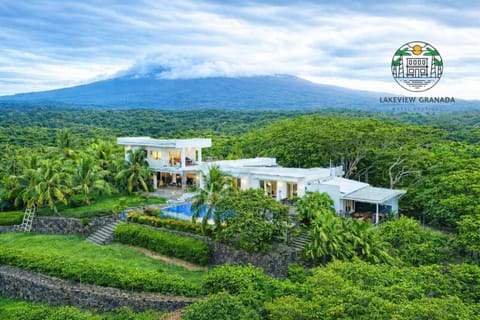 Property building, Nearby landmark, Natural landscape, Garden, View (from property/room), Mountain view, Pool view, Swimming pool