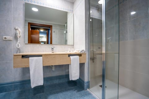 Shower, Bathroom, Facility for disabled guests, towels