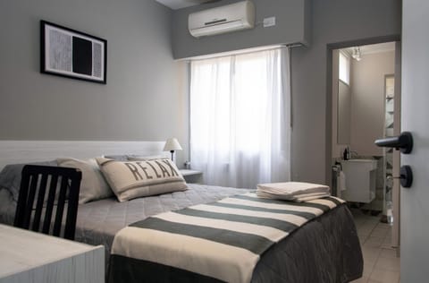 Bed, Photo of the whole room, Bedroom, towels, air conditioner