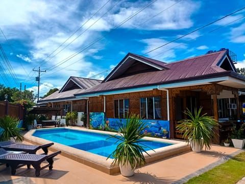 Property building, Pool view, Swimming pool, sunbed