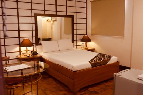 Bed, Living room, Seating area, Bedroom