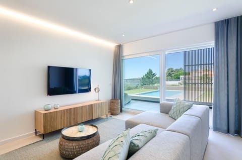 Communal lounge/ TV room, Living room, Seating area, Pool view