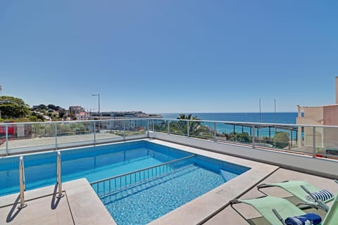 Day, Natural landscape, Beach, Pool view, Sea view, Swimming pool, sunbed, towels