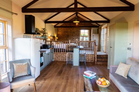 Bed, Kitchen or kitchenette, Seating area
