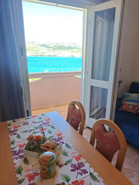 Natural landscape, View (from property/room), Balcony/Terrace, Living room, Seating area, Dining area, Sea view