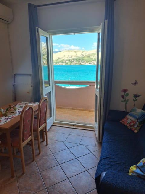 Natural landscape, View (from property/room), Balcony/Terrace, Living room, Dining area, Lake view, Sea view