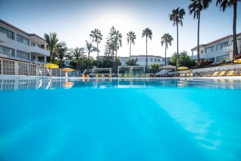 Property building, Swimming pool, Swimming pool, Sunrise