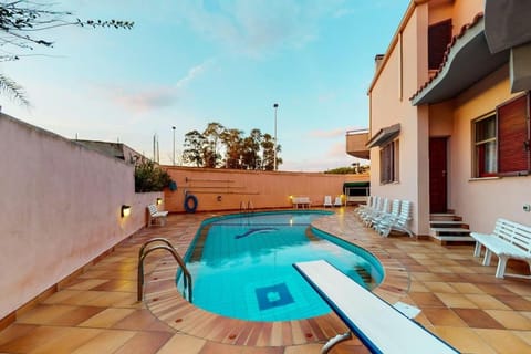 Property building, Pool view, Swimming pool, sunbed