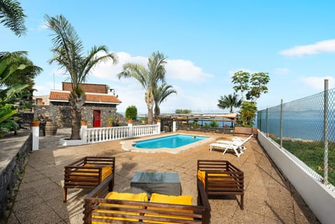 Property building, Living room, Swimming pool
