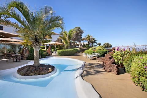 Property building, Living room, Swimming pool