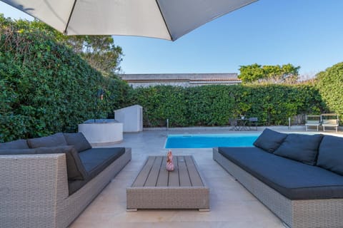 Property building, Living room, Swimming pool