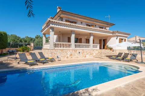 Property building, Patio, Pool view, Swimming pool, sunbed