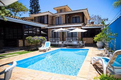 Property building, Patio, Garden, Pool view, Swimming pool, Swimming pool, sunbed