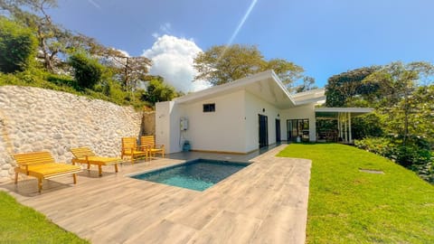 Property building, Natural landscape, Swimming pool, sunbed