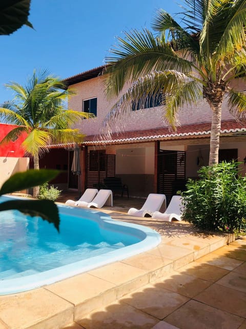 Property building, Garden, Pool view, Swimming pool, sunbed