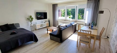 Communal lounge/ TV room, Bed, TV and multimedia, Living room, Photo of the whole room, Seating area, Dining area, Evening entertainment, Bedroom