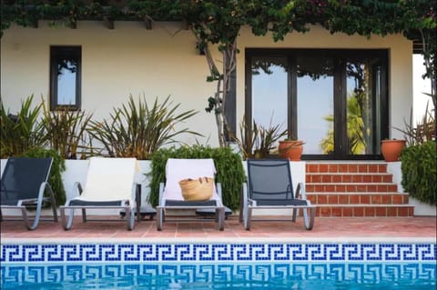 Property building, Living room, Swimming pool